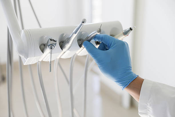 Professional Dental Implants technician working in Acres Green, CO
